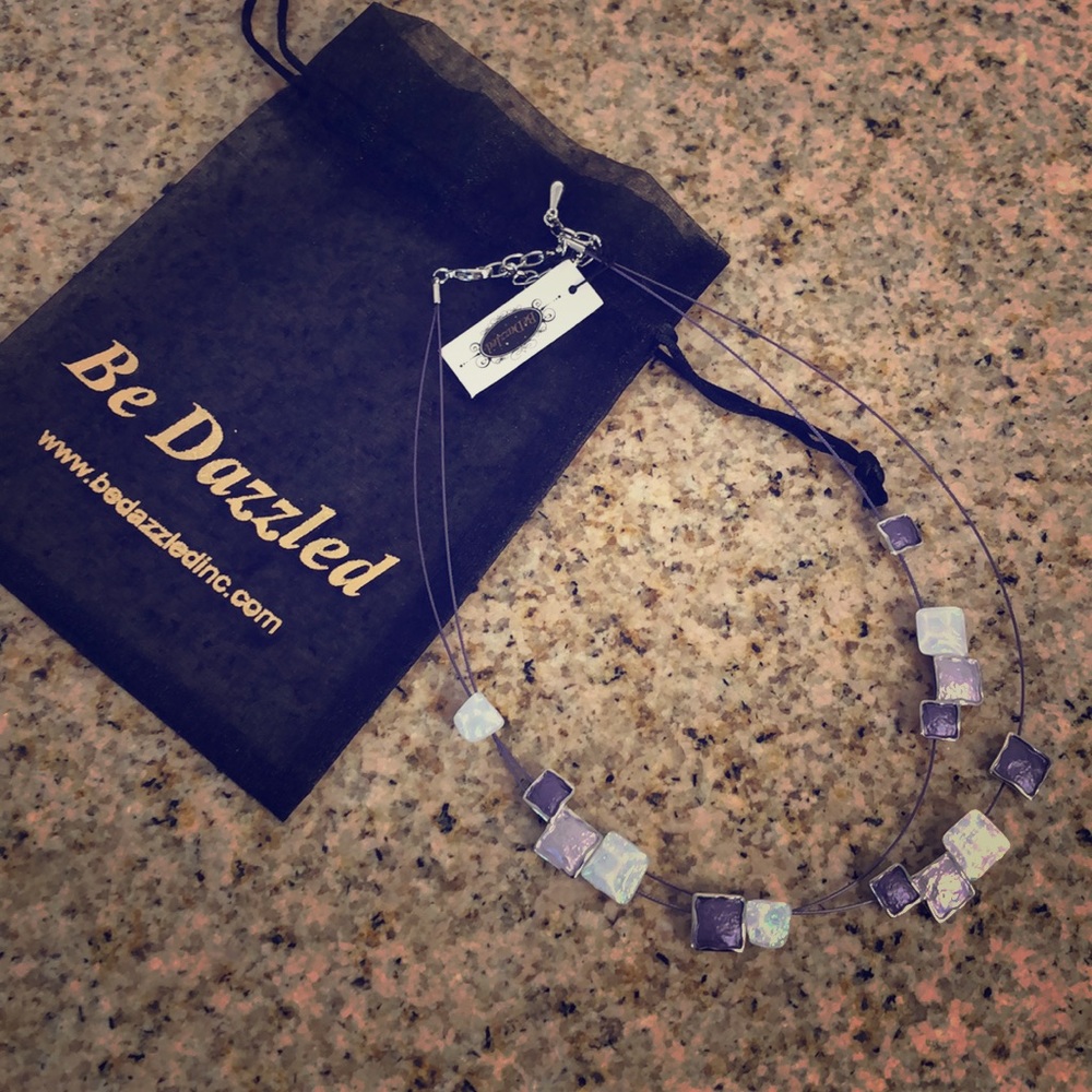 Necklace with purple, light purple, and white